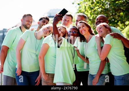 Volunteer People Taking Selfie Photo. Happy Group Stock Photo
