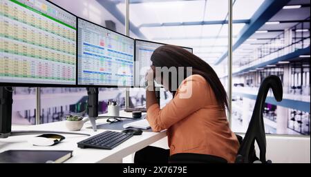 Data Analyst African Woman Using Spreadsheet On Computer Stock Photo