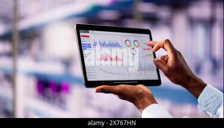 Finance Analytics Data Chart On Tablet Computer Stock Photo