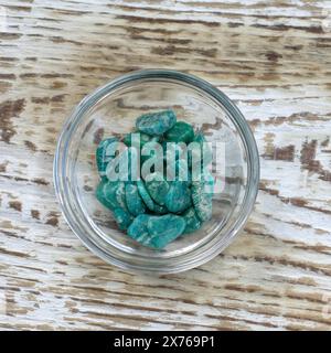 Amazonite also known as amazonstone Semi-Precious Gemstones on white textured background top view Stock Photo