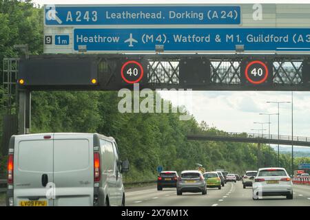 Surrey, UK. 18th May, 2024. It was a busy rush hour on the M25 Motorway in Surrey with speed restrictions in place due to various accidents. There are calls for Smart Motorways to be scrapped due to safety concerns and the number of deaths caused on them. A year ago Prime Minister Rishi Sunak, cancelled the roll out of any further Smart Motorway upgrades pending a safety review. Credit: Maureen McLean/Alamy Stock Photo