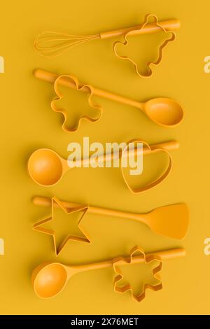 Set of metal cookie cutters for homemade Christmas biscuit on a yellow monochrome background. 3d render of making gingerbread cookies in the kitchen. Stock Photo