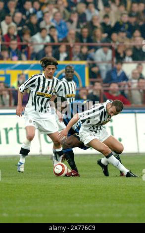 Milan Italy 04/04/2004: Paolo Montero,Juventus player, and Obafemi Martins, Inter player during the match Fc Inter-Fc Juventus Stock Photo