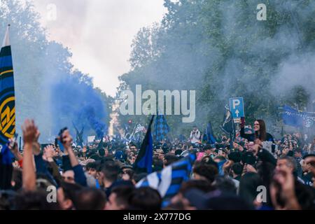 MILAN, ITALY - APRIL 28, 2024: The fans of F.C Internazionale celebrate by filling the street of the city, during the celebration tricolor Stock Photo