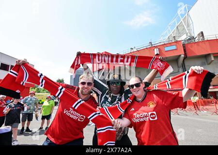Manchester United fans hold up their scarves ahead of the match, during the The FA Women's Super League match Manchester United Women vs Chelsea FC Women at Old Trafford, Manchester, United Kingdom, 18th May 2024  (Photo by Cody Froggatt/News Images) Stock Photo