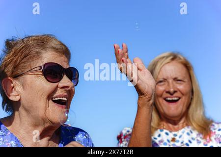 women family spending time together in summer. Leisure for elderly Stock Photo