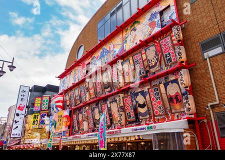 Osaka, Japan, April 16, 2024: Shinsekai entertainment area in Osaka City at sunset. Stock Photo