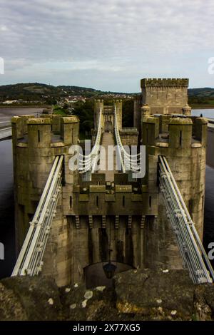 The Conwy suspension Bridge with its Medieval inspired turrets crossing the River Clwyd in North Wales Stock Photo