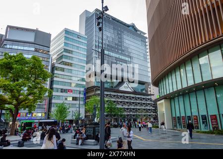 Osaka, Japan, April 16, 2024: Commercial and business buildings in downtown Osaka. Stock Photo