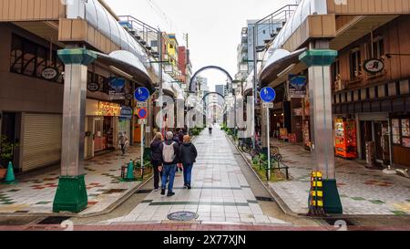 Osaka, Japan, April 16, 2024: Entertainment areas with restaurants and shops in Shinsekai. Stock Photo