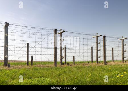 Electric barbed wire fence. Historical Area of the Czechoslovak fortification Satov for defense against Nazi Germany near Znojmo town in the South Mor Stock Photo
