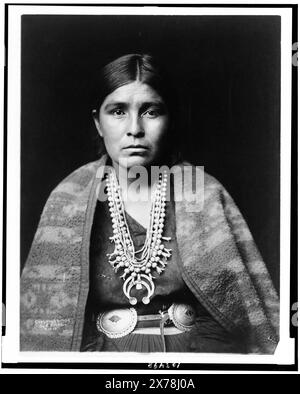 Head-and-shoulders portrait of Navajo woman, facing front, Edward S. Curtis Collection., Curtis no. 1019.. Indians of North America, Women, 1900-1910. , Navajo Indians, Women, 1900-1910. , Navajo Indians, Clothing & dress, 1900-1910. Stock Photo