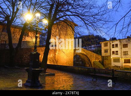 Balmaseda old bridge illuminated at dusk Stock Photo