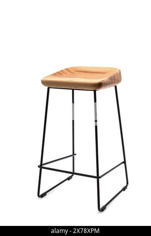 Steel frame high bar stool with a wooden seat. Loft style interior. Stock Photo