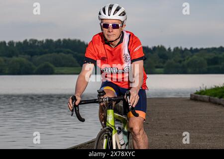 Mark Crowther, who has cycled to every Luton Town 2023/24 Premier League Away match for charity and to raise awareness of Mental Health at Milton Keyn Stock Photo