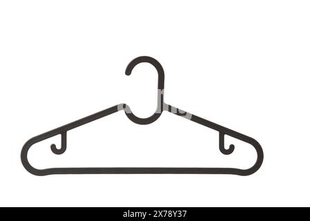 Black plastic hanger isolated over the white background. Stock Photo