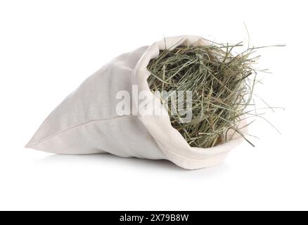 Dried hay in burlap sack isolated on white Stock Photo