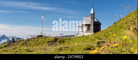 Small wooden church or chapel on the mountain top Col di Lana, Alps Dolomites mountains, Italy Stock Photo