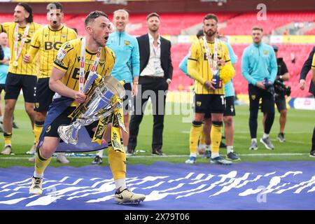 London, UK. 18th May, 2024. Oxford United's Sam Long celebrates after the Bolton Wanderers FC v Oxford United FC sky bet EFL League One Play-Off Final at Wembley Stadium, London, England, United Kingdom on 18 May 2024 Credit: Every Second Media/Alamy Live News Stock Photo