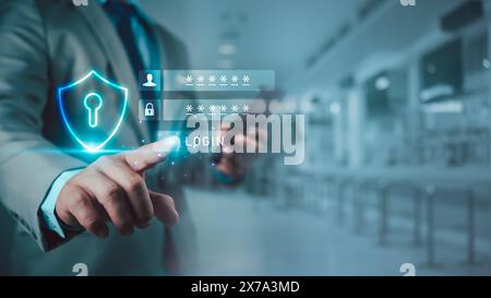 Businessman showing Symbolic shield represents protection against cybe rattacks and online hacking, Protection against external hacks, code protection Stock Photo