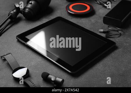 Set of different gadgets on dark background, closeup Stock Photo