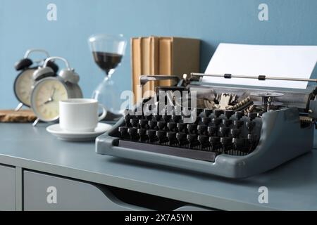 Vintage typewriter on table in office, closeup Stock Photo