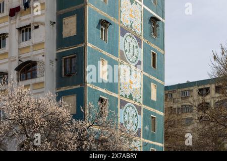 Soviet era mosaic facade on a residential apartment block, Tashkent Uzbekistan Stock Photo