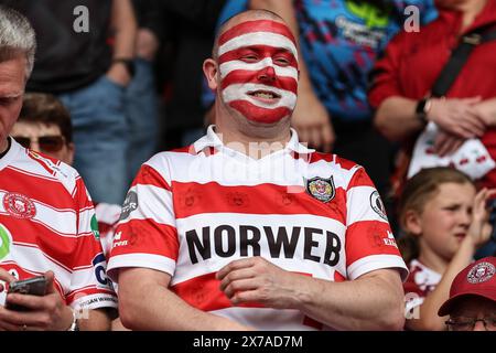 Doncaster, UK. 18th May, 2024. Wigan fan with cherry and white face paint during the Betfred Challenge Cup Semi-Final Hull KR v Wigan Warriors at Eco-Power Stadium, Doncaster, United Kingdom, 18th May 2024 (Photo by Mark Cosgrove/News Images) in Doncaster, United Kingdom on 5/18/2024. (Photo by Mark Cosgrove/News Images/Sipa USA) Credit: Sipa USA/Alamy Live News Stock Photo