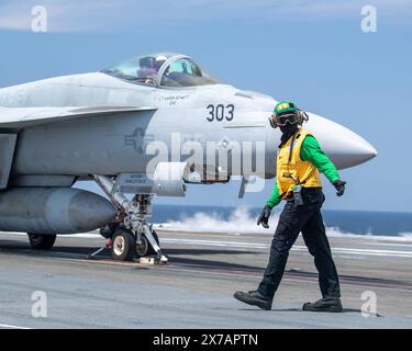 NORTH PACIFIC OCEAN (May 18, 2024) Aviation Boatswain’s Mate (Launch/Recovery Equipment) 2nd Class Anthony Henry, from New York, prepares to launch an Stock Photo