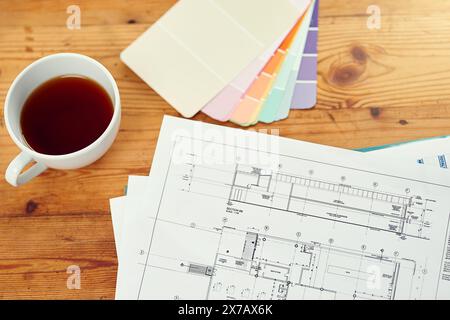 Color, swatch and planning home renovation with blueprint on table from above with interior design. Creative, ideas and decision for project in house Stock Photo