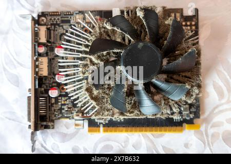Small video card with very dusty cooler fan Stock Photo