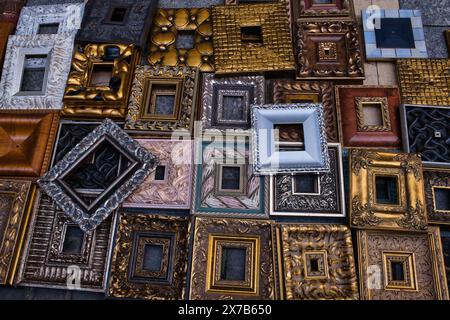 Collection of decorated frames in a stall at El Rastro market in Madrid Stock Photo