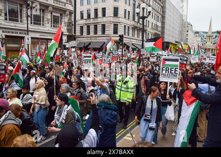 A large crowd of protesters at a pro Palestine march marking 200 days ...