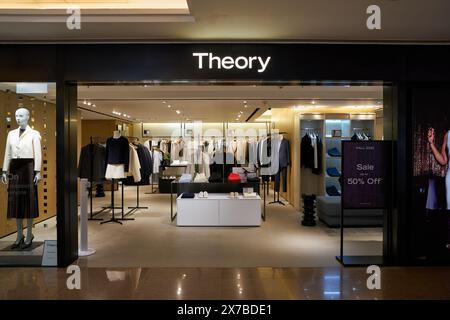 HONG KONG, CHINA - DECEMBER 05, 2023: entrance to Theory store inside Harbour City. Harbour City is a shopping centre in Tsim Sha Tsui, Kowloon. Stock Photo