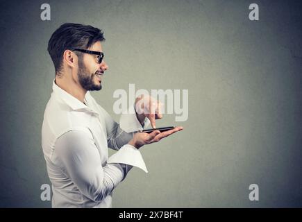 delivery service via modern technology. man using mobile phone app to order things online Stock Photo