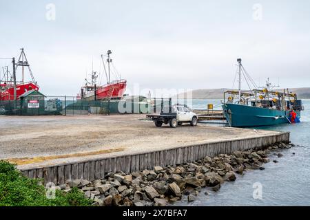 Fishing boats tied up to jetty at Stanley Harbour, Stanley, Tasmania Stock Photo