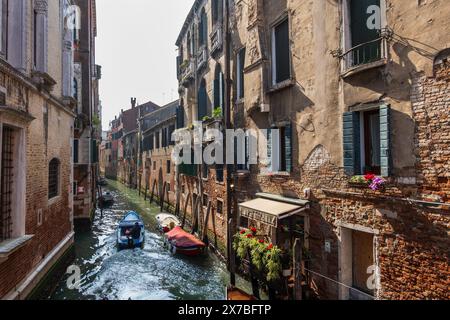 City of Venice, Italy, canal in San Polo district and Osteria Da Fiore restaurant, view from Ponte Bernarndo bridge. Stock Photo