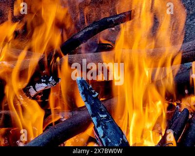 The wood burned for barbecue or barbecue created a fascinating image with flames. Stock Photo