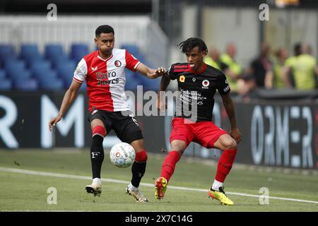 ROTTERDAM - (l-r) Marcos Lopez of Feyenoord, Mimeirhel Benita of sbv Excelsior during the Dutch Eredivisie match between Feyenoord and Excelsior Rotterdam at Feyenoord Stadion de Kuip on May 19, 2024 in Rotterdam, Netherlands. ANP BART STOUTJESDIJK Stock Photo