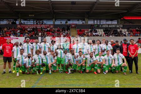 Manchester, UK. 18th May, 2024. Len Johnson celebrity team line up.Len Johnson celebrity football match versus FC United Legends at Broadhurst Park Stadium. The match is being organised to recognise former uncrowned boxing champion, Len Johnson and raise money for a proposed statue to be sited in Manchester. In attendance at the game were a host of celebrities such as local Mancunian rapper Lady Ice, popular YouTuber Angry Ginge, actor Lamin Touray and apprentice star Kayode Damali. Picture Garyroberts/worldwidefeatures.com Credit: GaryRobertsphotography/Alamy Live News Credit: GaryRobertsphot Stock Photo