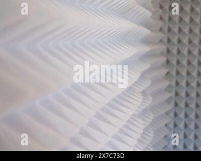 Audio Treatment Material. Grey foam with pyramid shapes for sound dampening. Stock Photo