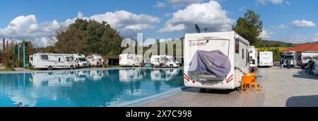 Ouezzane, Morocco - 2 Marhc, 2024: many motor homes and RVs parked around a swimming pool at a hotel in the Rif mountains of northern Morocco Stock Photo