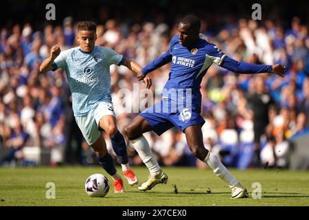 Chelsea's Nicolas Jackson (right) and Bournemouth's Milos Kerkez battle for the ball during the Premier League match at Stamford Bridge, London. Picture date: Sunday May 19, 2024. Stock Photo