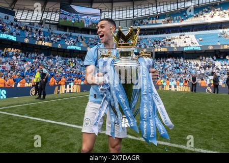 Phil Foden of Manchester City poses with the Barclays Premier League ...