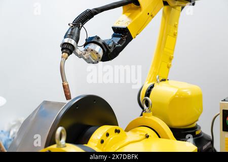 Welding robot arms on a smart factory. Stock Photo