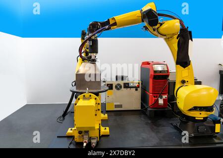 Welding robot arms on a smart factory. Stock Photo