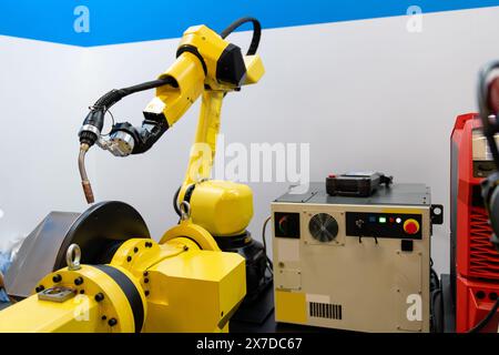 Welding robot arms on a smart factory. Stock Photo
