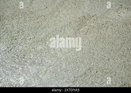 Selective focus, textured background image of fresh mixed concrete in construction Stock Photo