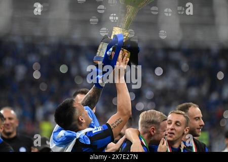 Giuseppe Meazza Stadium, Milan, Italy on May 19, 2024. Lautaro Martinez of FC Internazionale poses with the Scudetto trophy during Serie A 2023/24 football match between FC Internazionale and SS Lazio at Giuseppe Meazza Stadium, Milan, Italy on May 19, 2024 Credit: Tiziano Ballabio/Alamy Live News Stock Photo