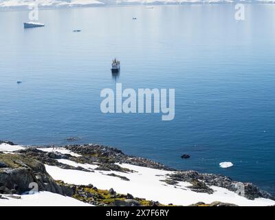 Antarctic cruise ship anchored at Palaver Point, Two Hummock Island, Palmer Archipelago. Stock Photo